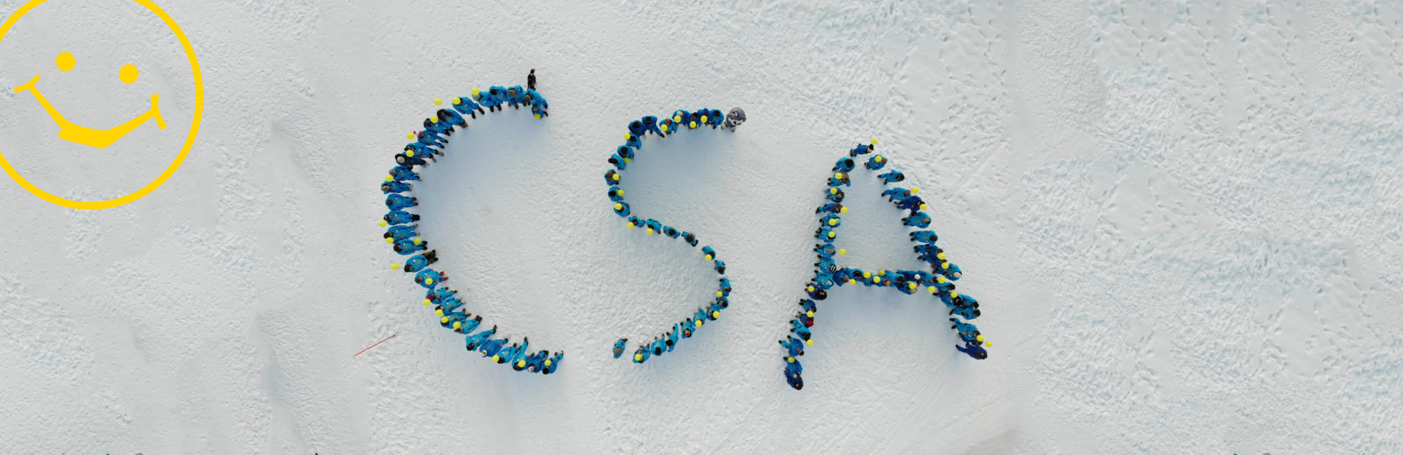 The letters CSA formed by the guides in the snow